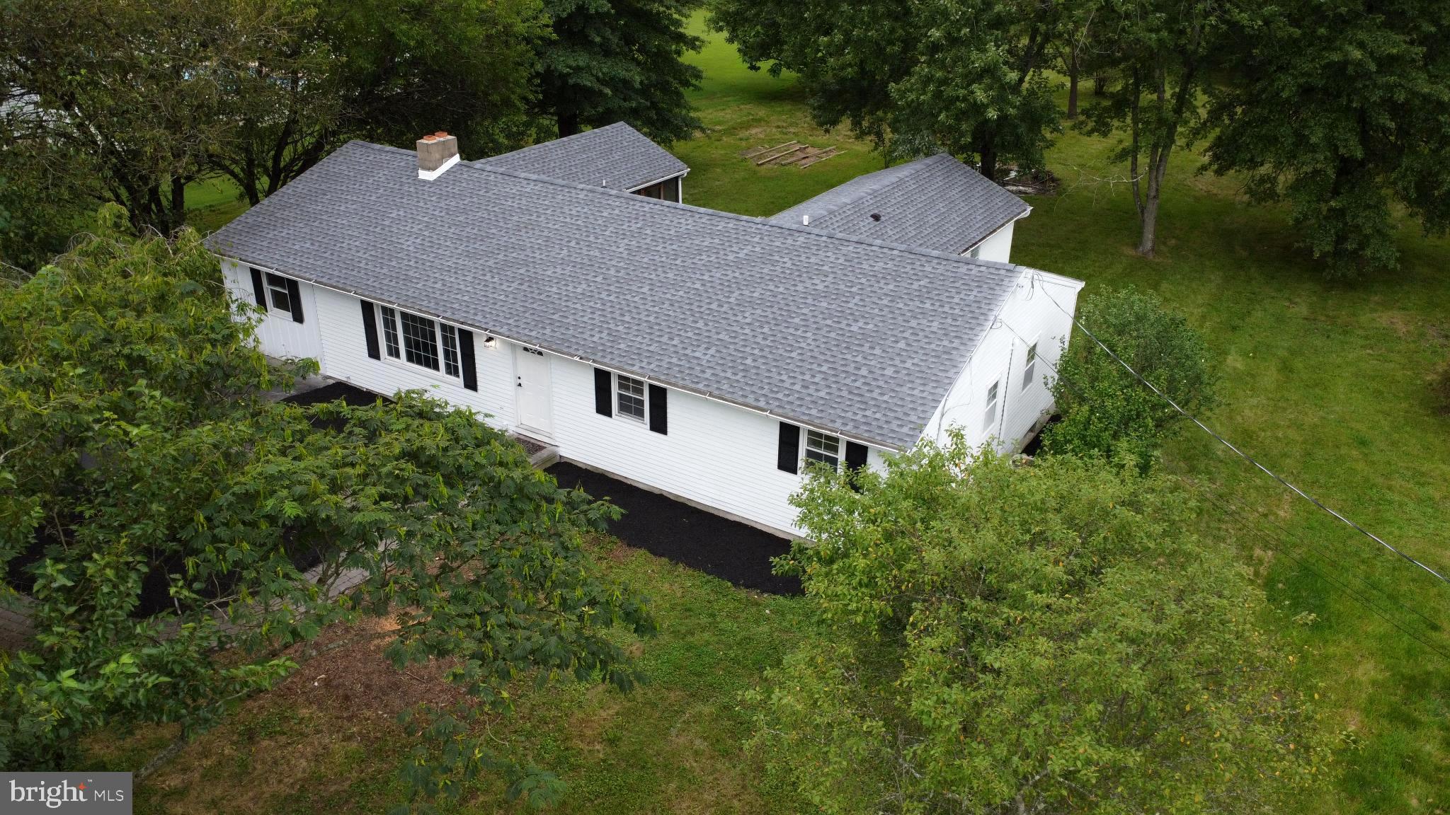 66 Rocky Ridge Road Quakertown, PA 18951 - Photo 39 of 42 Charming home nestled in lush greenery.