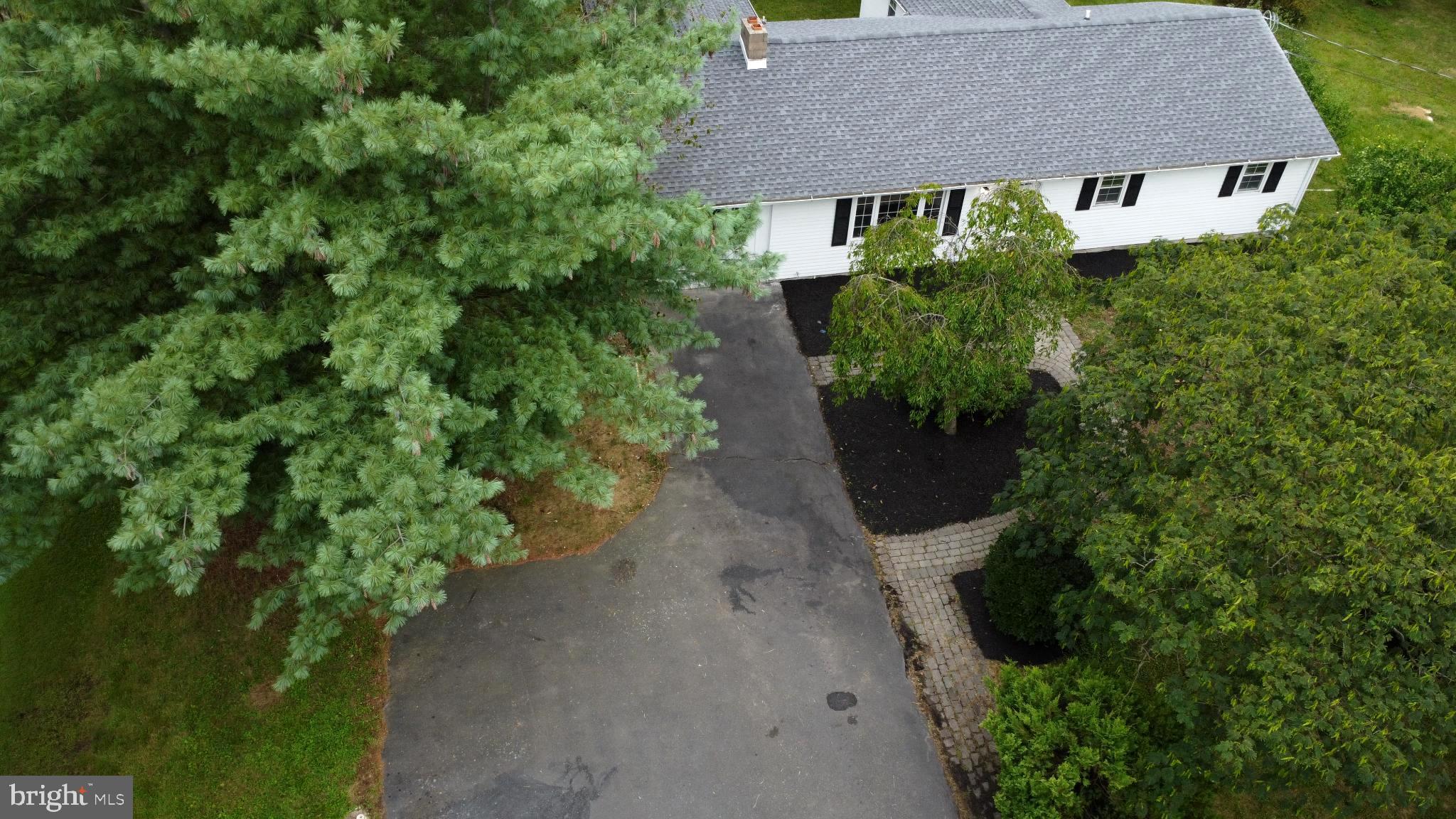 66 Rocky Ridge Road Quakertown, PA 18951 - Photo 40 of 42 Charming home nestled among lush greenery.