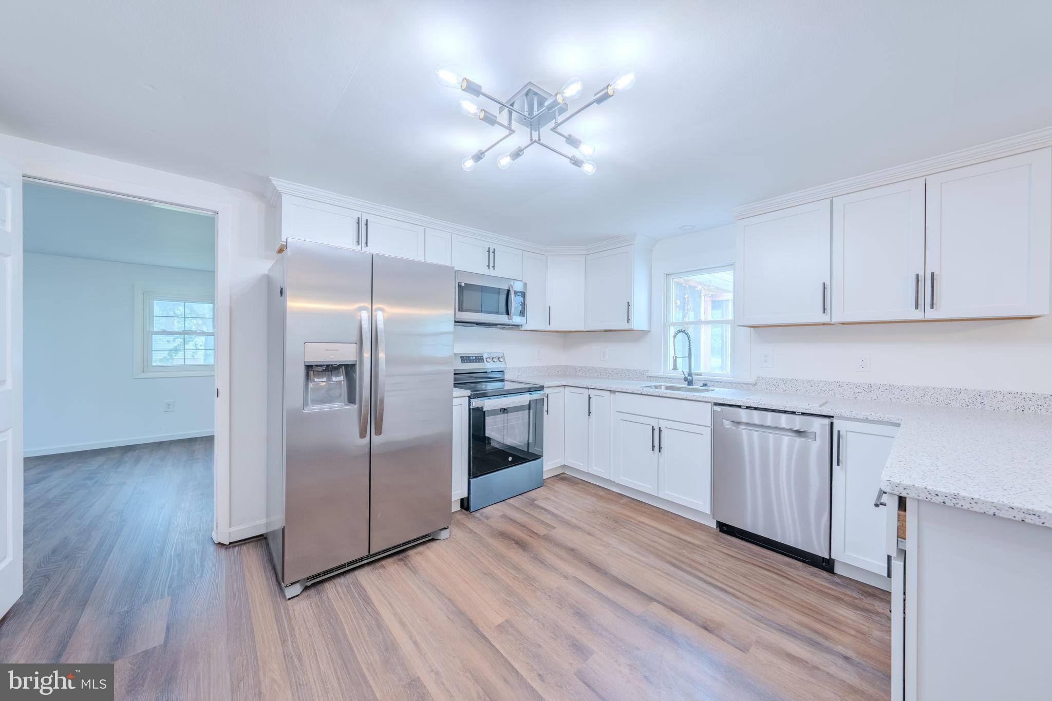 66 Rocky Ridge Road Quakertown, PA 18951 - Photo 4 of 42 Modern kitchen with sleek finishes.