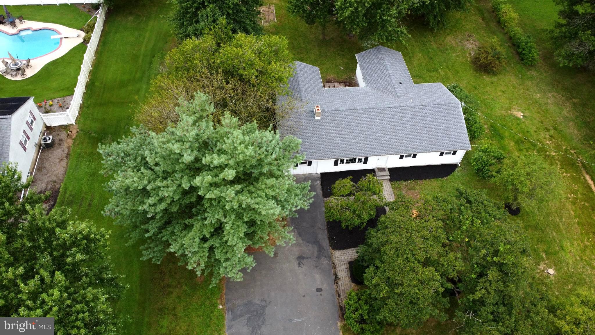 66 Rocky Ridge Road Quakertown, PA 18951 - Photo 41 of 42 Charming home nestled among lush greenery.