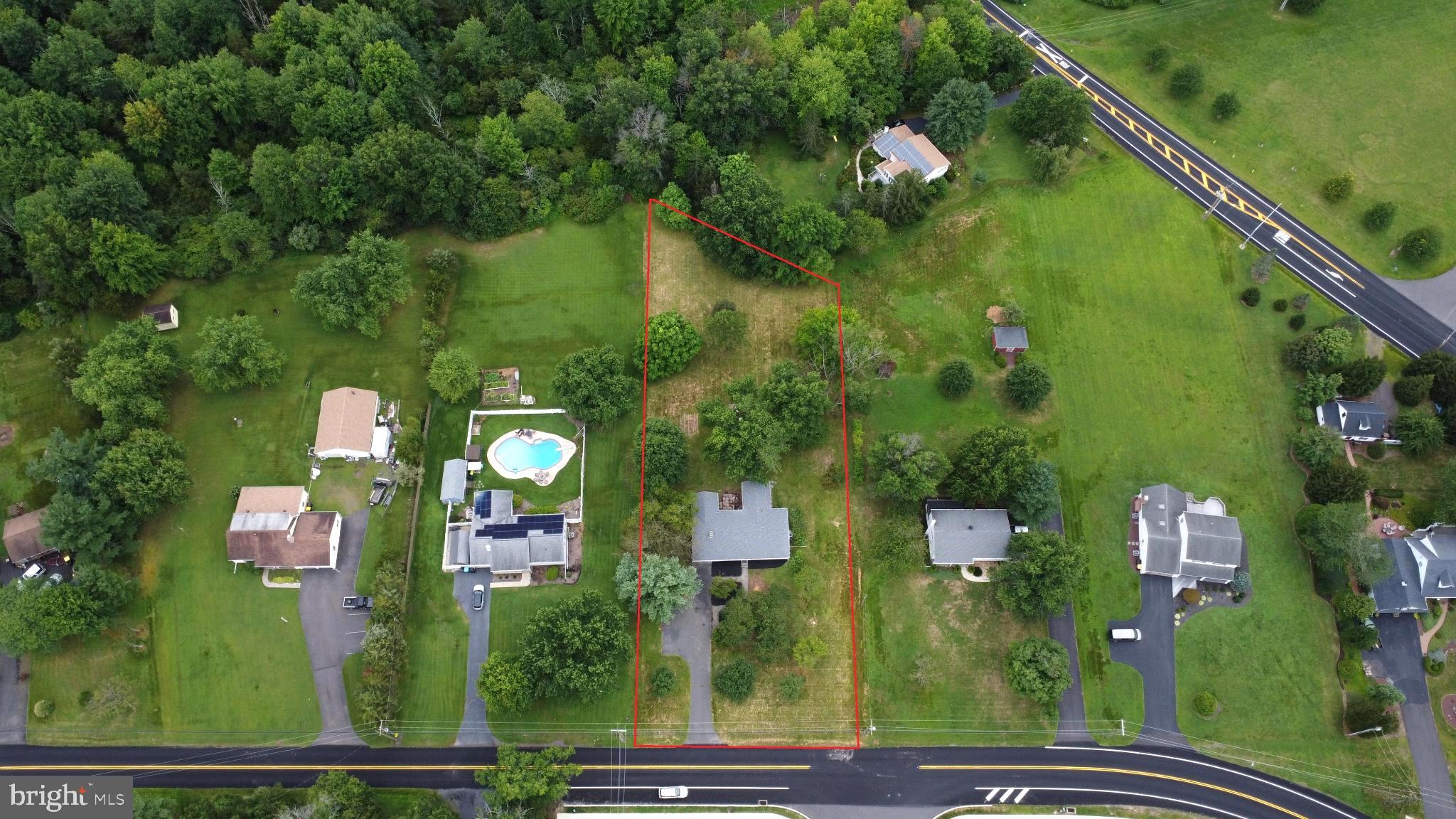 66 Rocky Ridge Road Quakertown, PA 18951 - Photo 42 of 42 Spacious lot nestled among lush greenery.