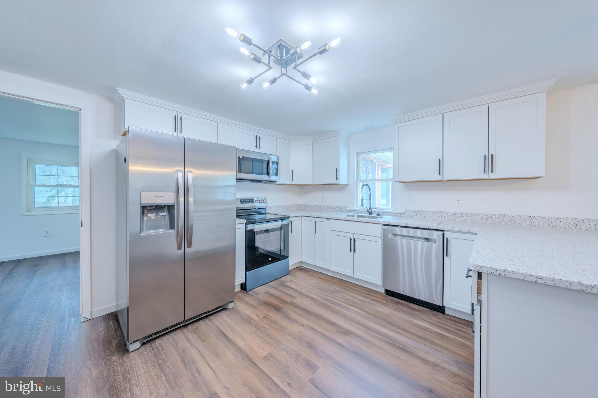 66 Rocky Ridge Road Quakertown, PA 18951 - Photo 5 of 42 Modern kitchen with sleek appliances.