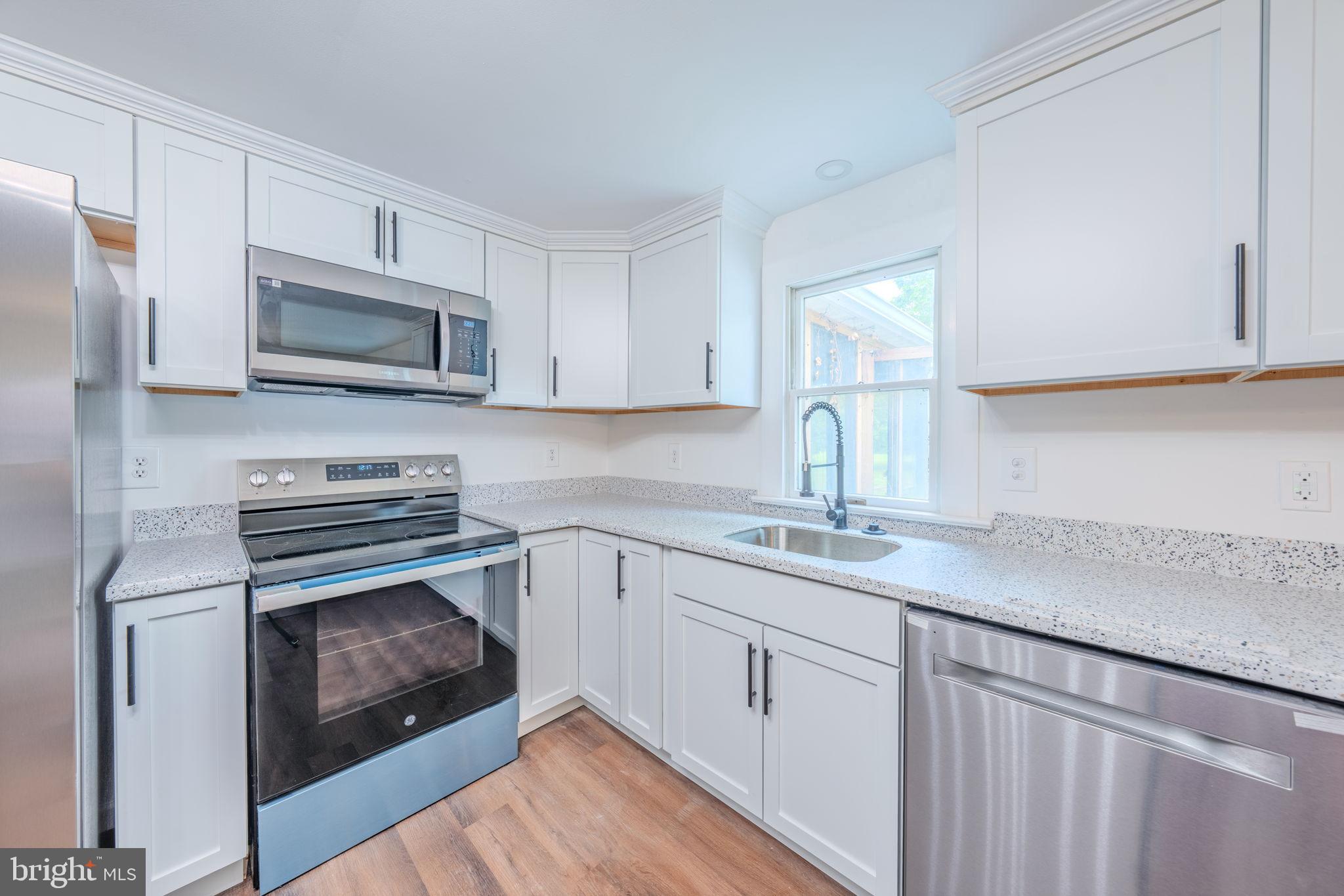 66 Rocky Ridge Road Quakertown, PA 18951 - Photo 6 of 42 Modern kitchen with sleek finishes.