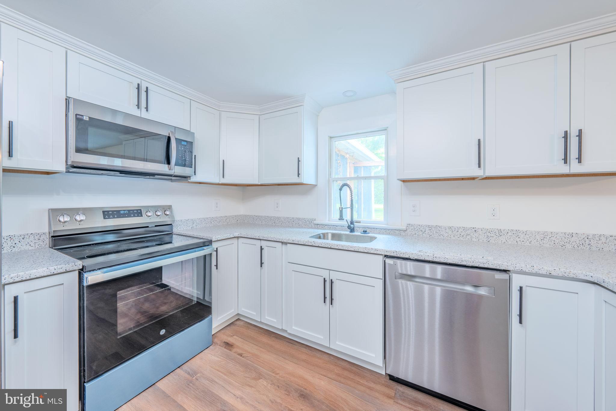 66 Rocky Ridge Road Quakertown, PA 18951 - Photo 7 of 42 Modern kitchen with sleek finishes.