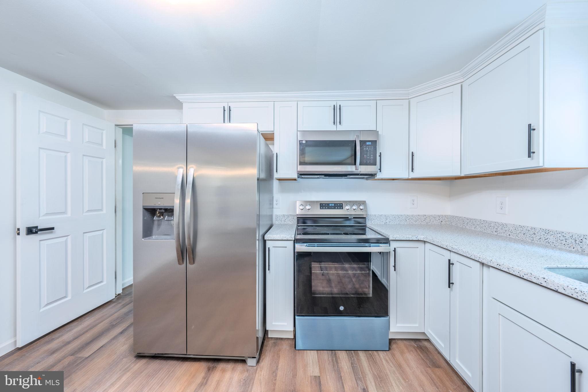66 Rocky Ridge Road Quakertown, PA 18951 - Photo 8 of 42 Modern kitchen with sleek appliances.