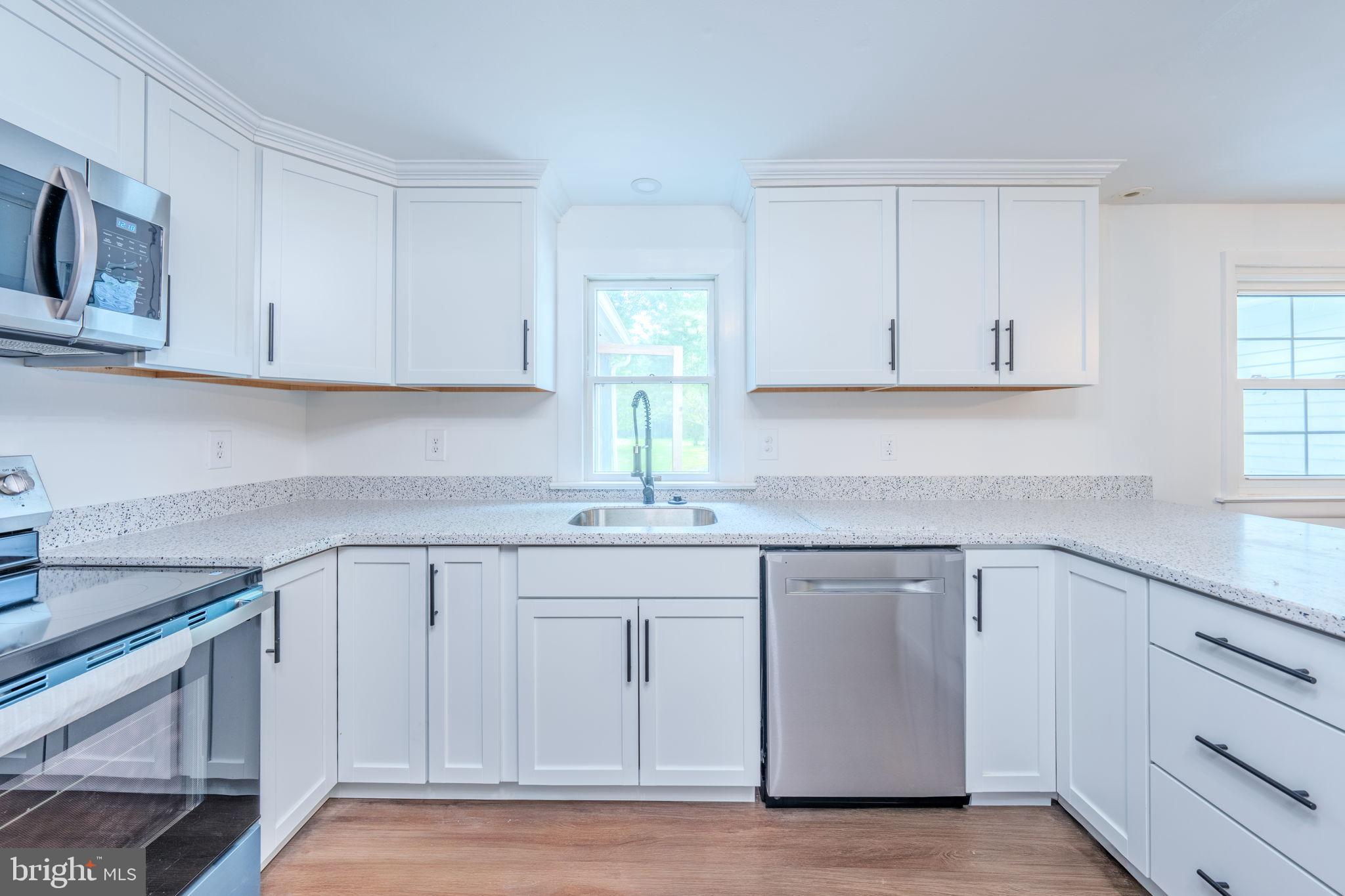 66 Rocky Ridge Road Quakertown, PA 18951 - Photo 9 of 42 Modern kitchen with sleek finishes.