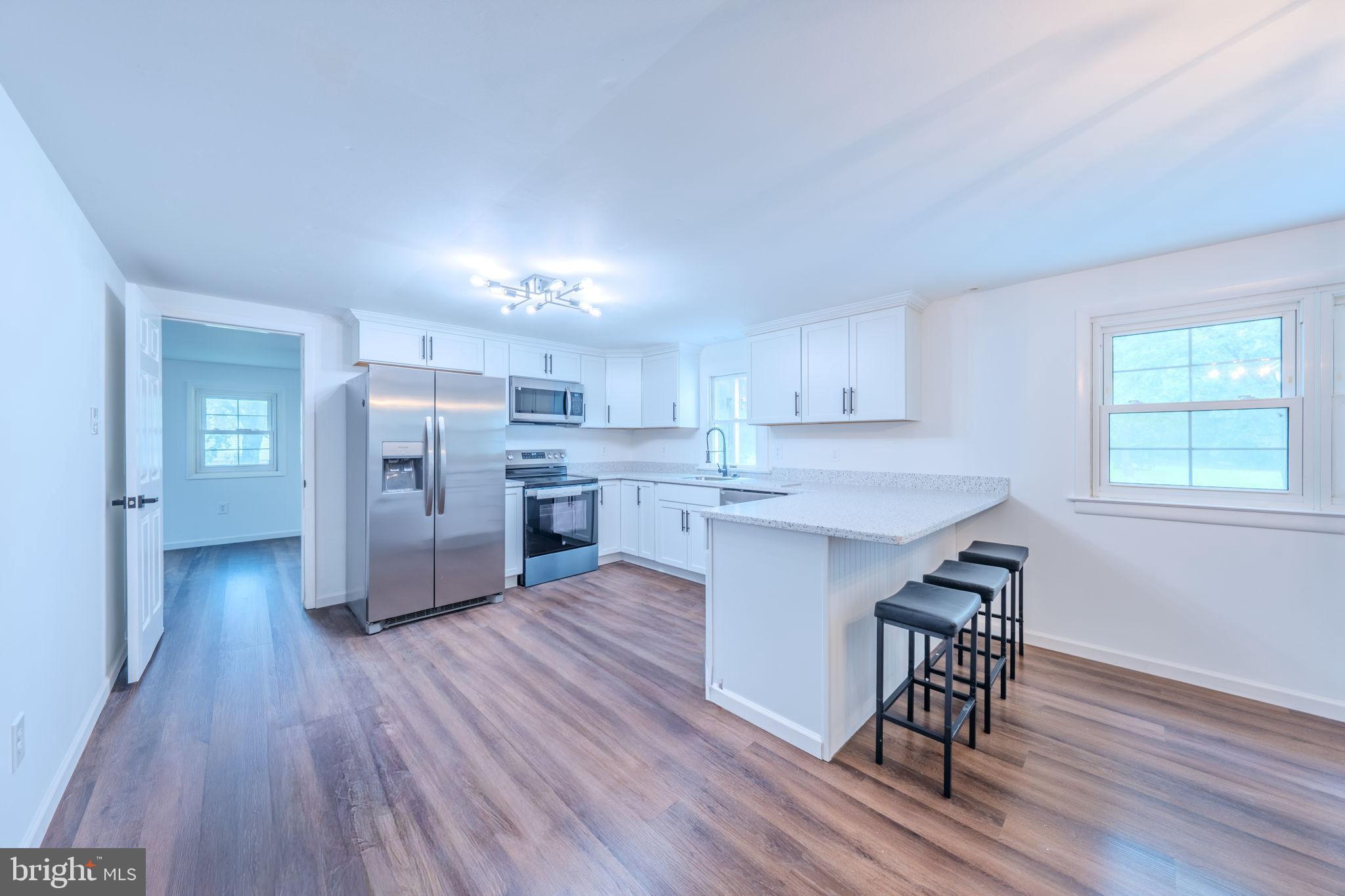 66 Rocky Ridge Road Quakertown, PA 18951 - Photo 10 of 42 Bright, modern kitchen with sleek finishes.