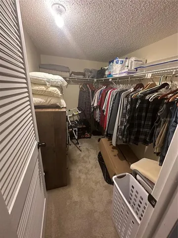 a bathroom with a double vanity sink and mirror