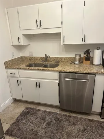 a close view of laundry room with a washer and dryer
