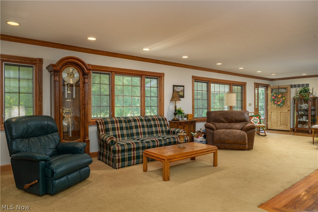 2371 Sunnybrook Road Mogadore, OH 44260 - Photo 25 of 26 Carpeted living room with crown molding