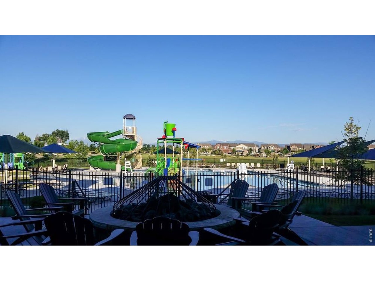 6820 Rainier Road Timnath, CO 80547 - Photo 42 of 50 Relax by the Fire and Watch the Kids have a Blast!