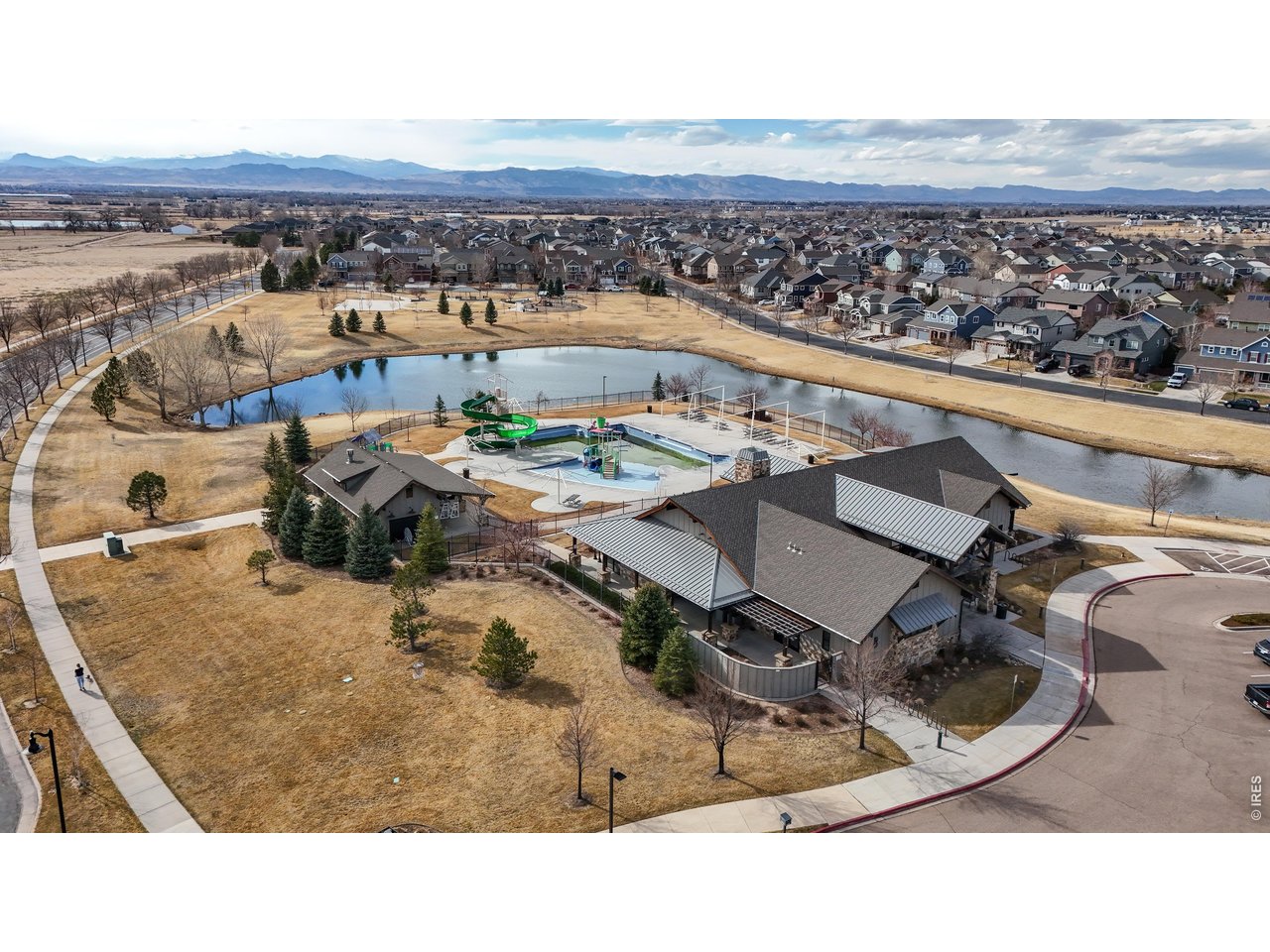 6820 Rainier Road Timnath, CO 80547 - Photo 45 of 50 Clubhouse, pickle ball, tennis courts, pool, trails and lakes make up this fabulous neighborhood!