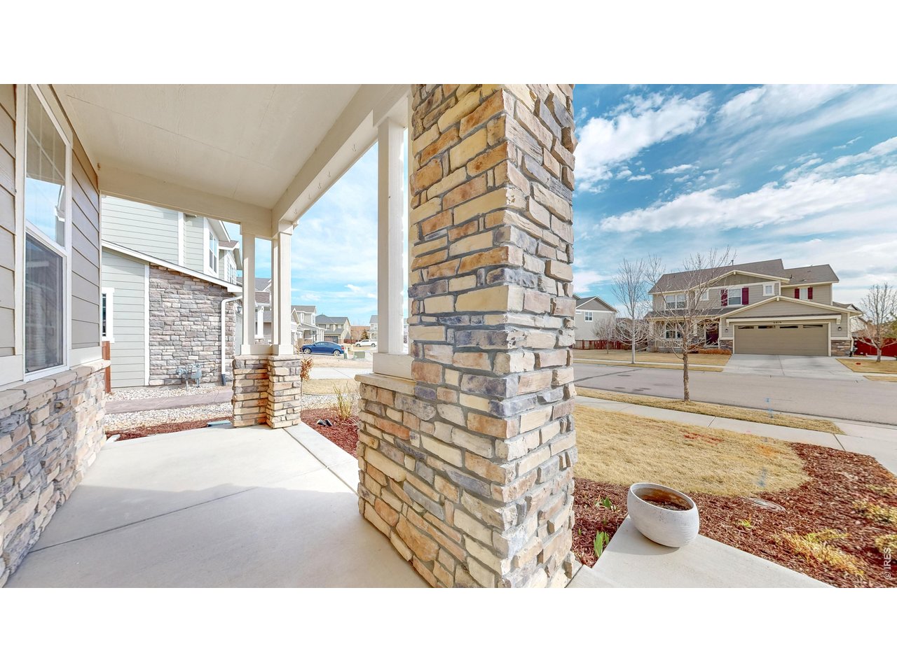 6820 Rainier Road Timnath, CO 80547 - Photo 47 of 50 Covered Front Porch - Sit Back and Watch The Day Go By!