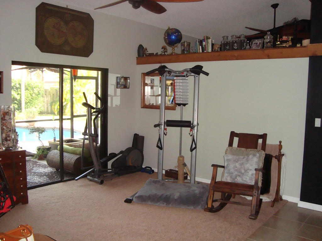 21321 Summertrace Circle Boca Raton, FL 33428 - Photo 3 of 22 a room with gym equipment and a large window