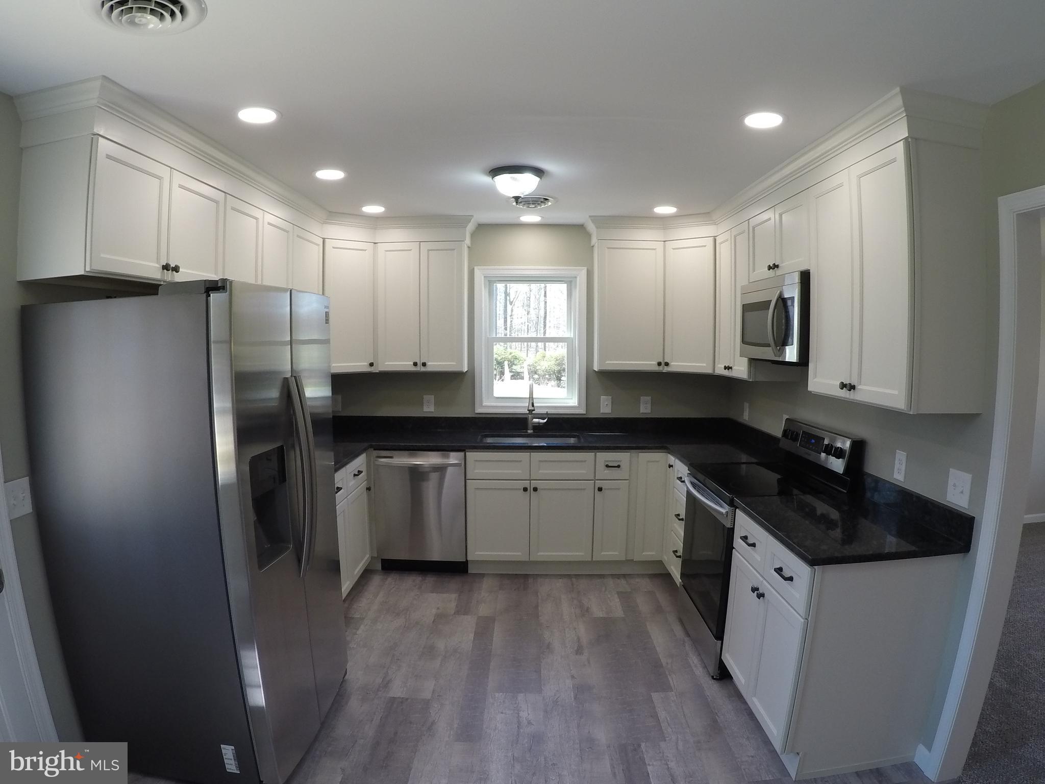 1724 Theodore Road Rising Sun, MD 21911 - Photo 7 of 27 Kitchen with granite counters & SS Appliances.