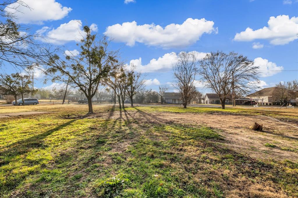 605 East Adams Street Itasca, TX 76055 - Photo 12 of 23 a view of yard with green space