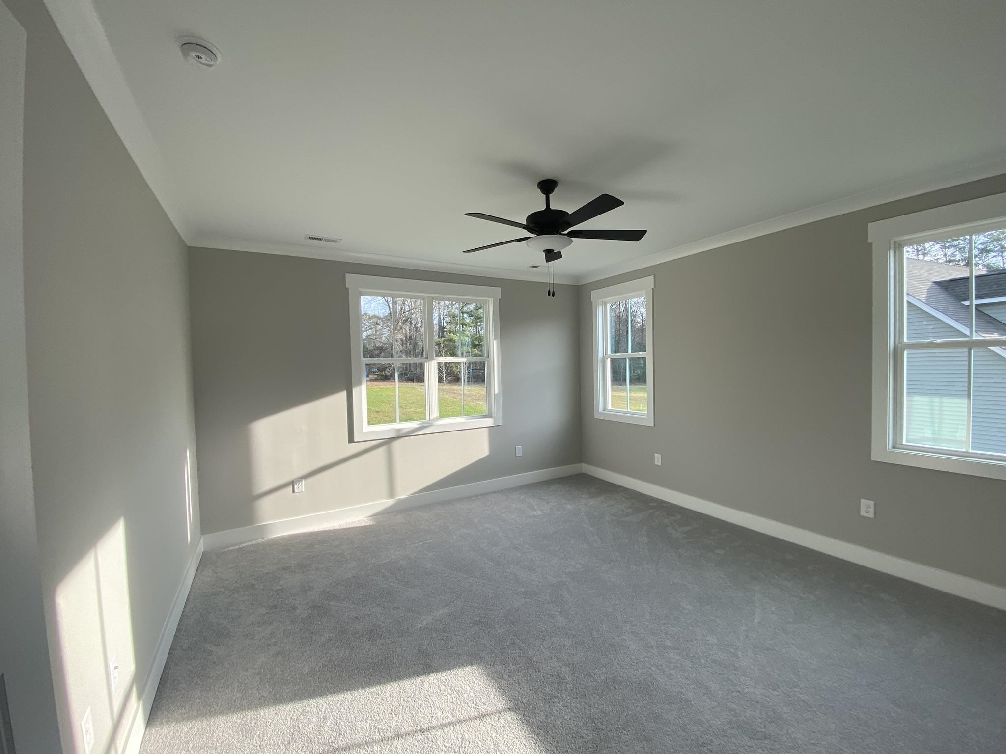 75 Buckstone Place Willow Spring, NC 27592 - Photo 12 of 32 a view of an empty room with a window