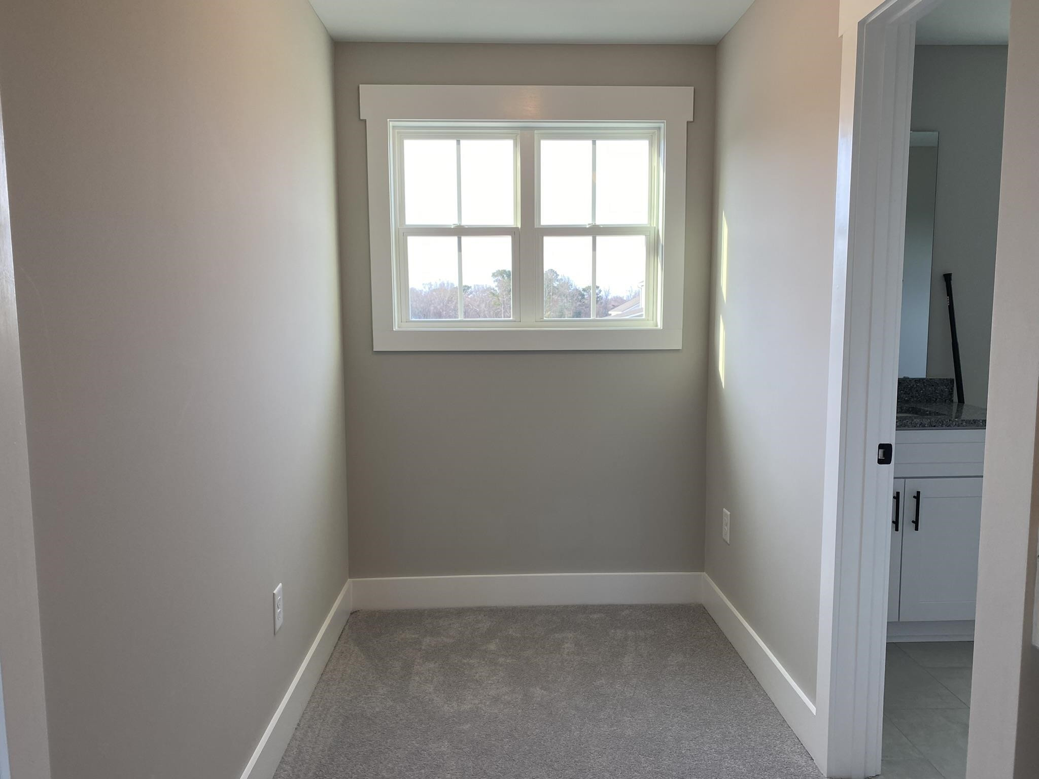 75 Buckstone Place Willow Spring, NC 27592 - Photo 22 of 32 an empty room and a window