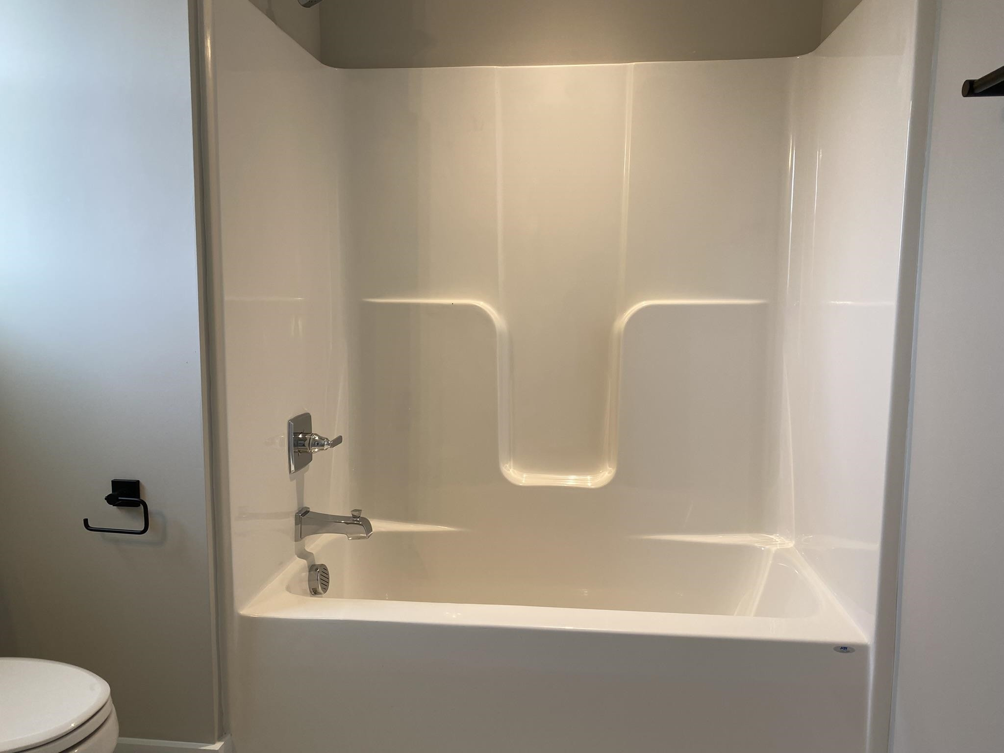 75 Buckstone Place Willow Spring, NC 27592 - Photo 24 of 32 a bathroom with a bathtub