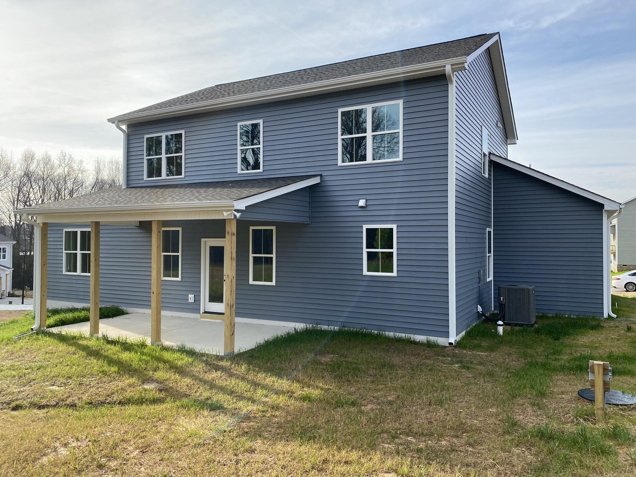 75 Buckstone Place Willow Spring, NC 27592 - Photo 31 of 32 a front view of a house with garden