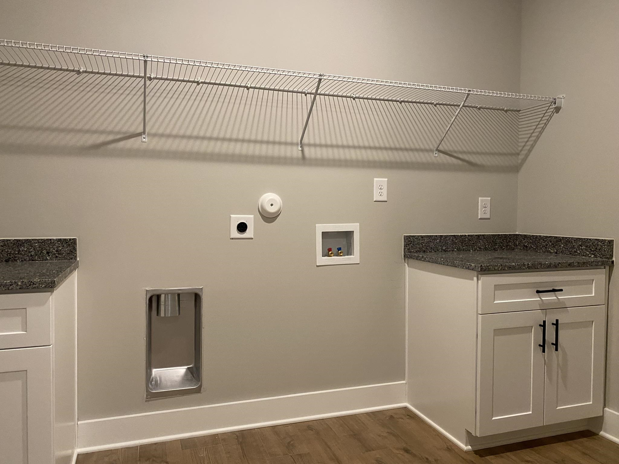 75 Buckstone Place Willow Spring, NC 27592 - Photo 10 of 32 a view of a utility room with closet