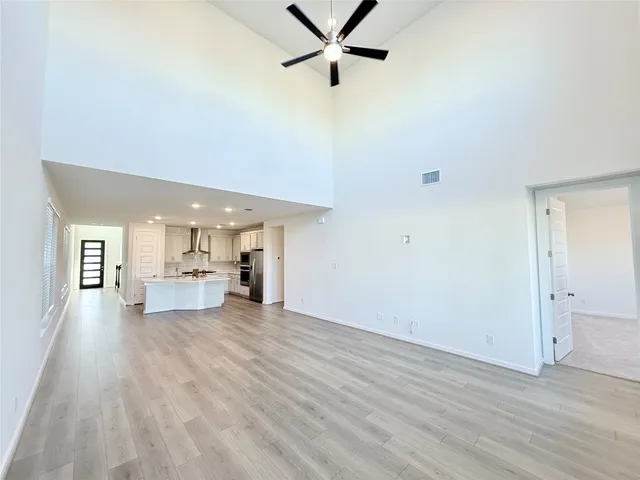 a view of kitchen with wooden floor