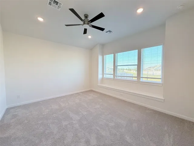 a view of a room with a sink and a window