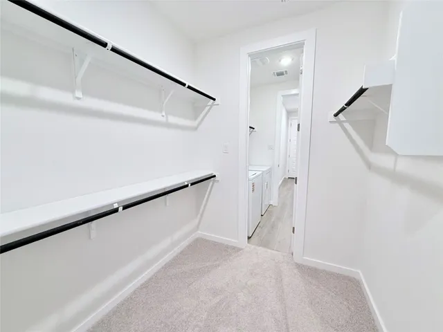 a bathroom with a sink a mirror and a shower