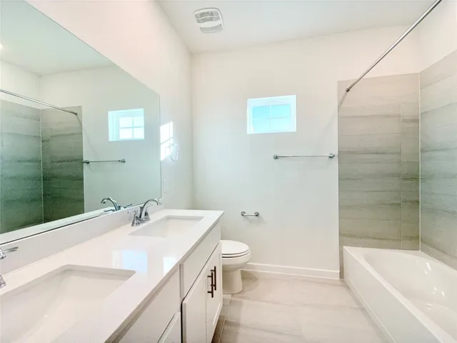 an empty room with closet area