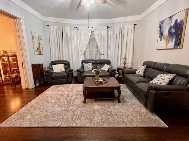 a living room with furniture and a couch