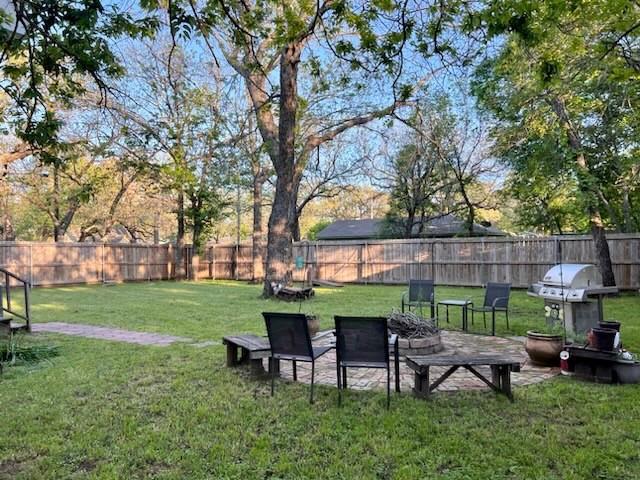 602 South Robinson Street Cleburne, TX 76031 - Photo 7 of 7 a view of a table and chairs in the garden