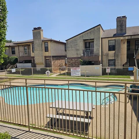 a front view of a house with glass windows