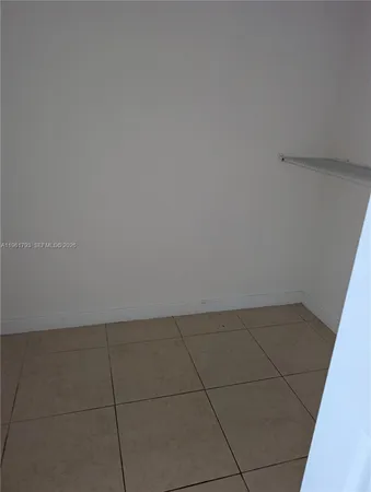 a view of a sink and microwave