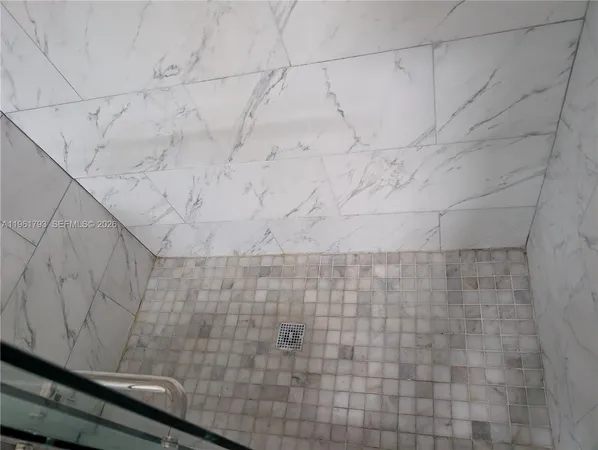 a close view of a utility room with washer and dryer