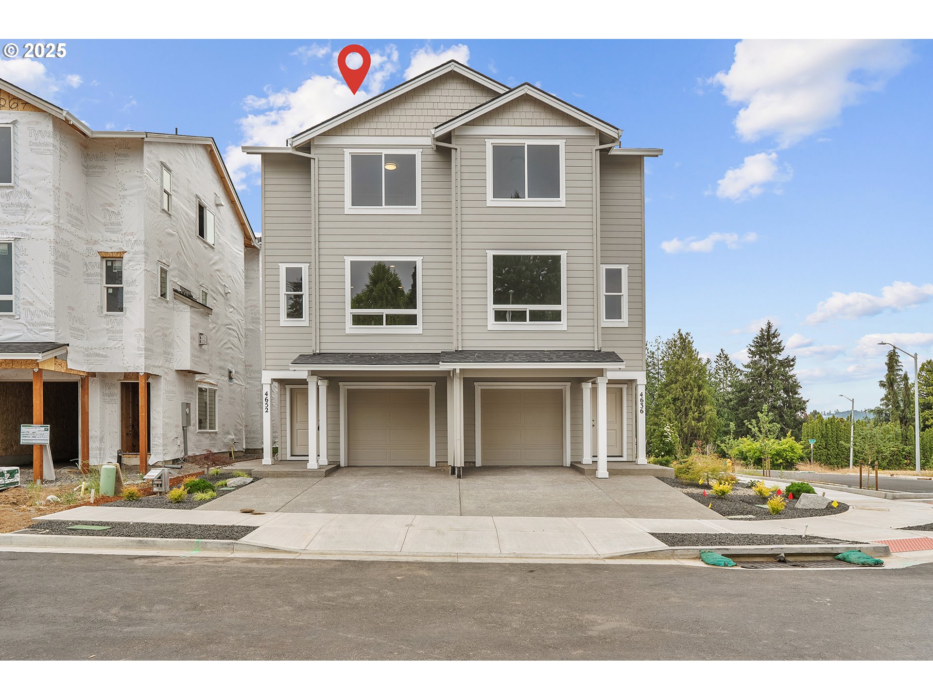 a view of a house with a street