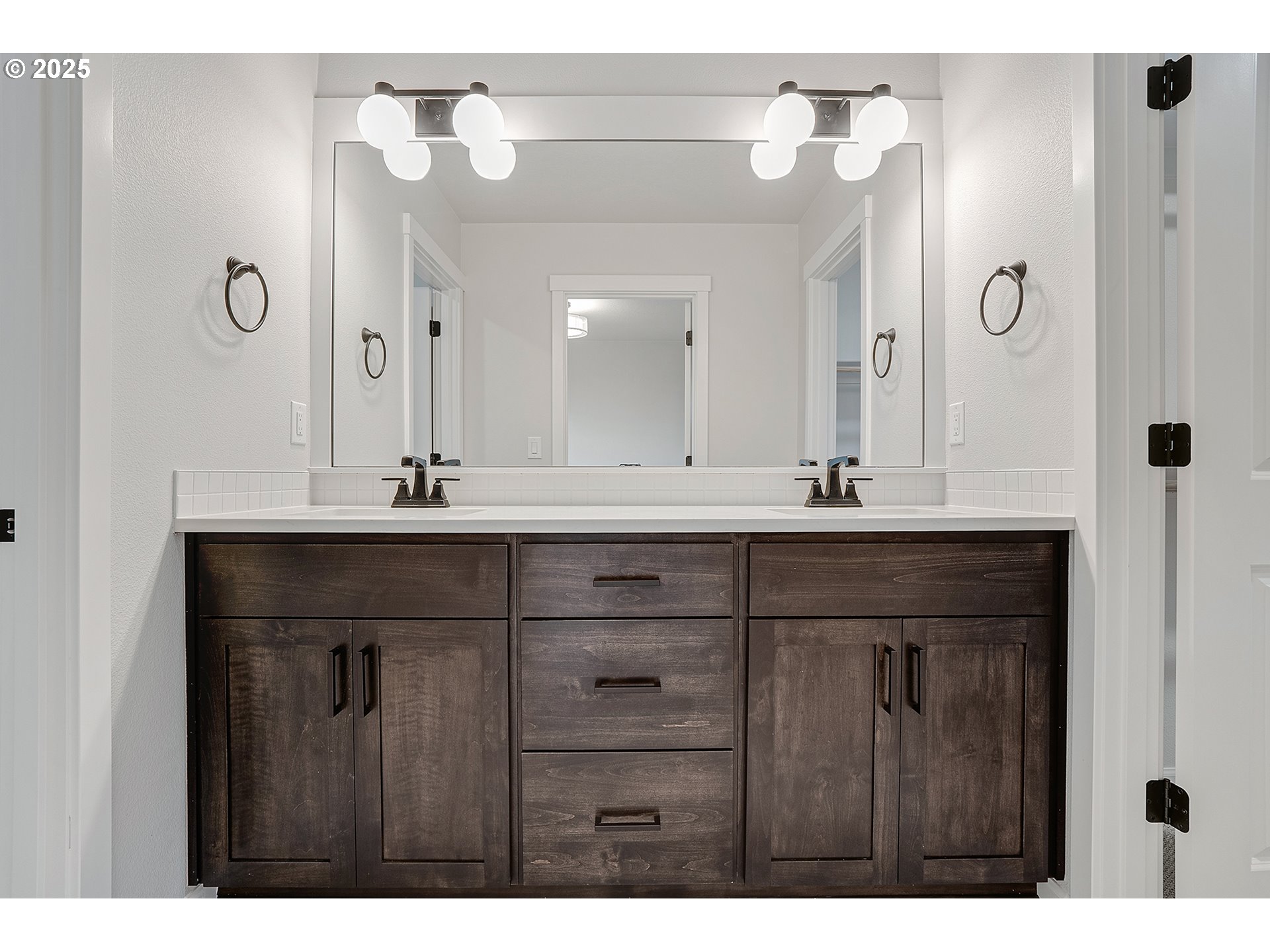4652 Southeast 2nd Street Gresham, OR 97080 - Photo 18 of 30 a bathroom with a sink vanity and a mirror