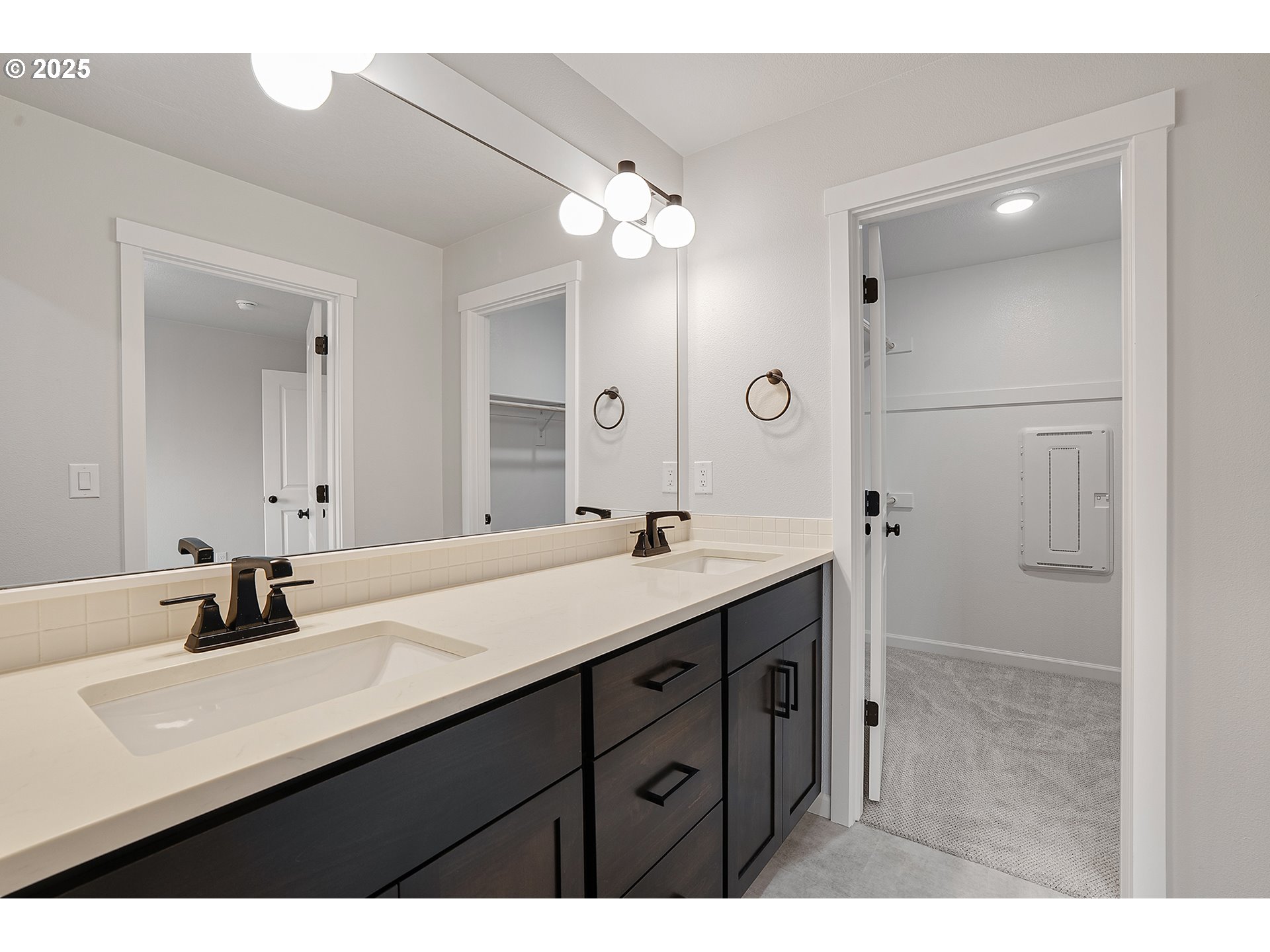 4652 Southeast 2nd Street Gresham, OR 97080 - Photo 20 of 30 a bathroom with a sink double vanity and a mirror