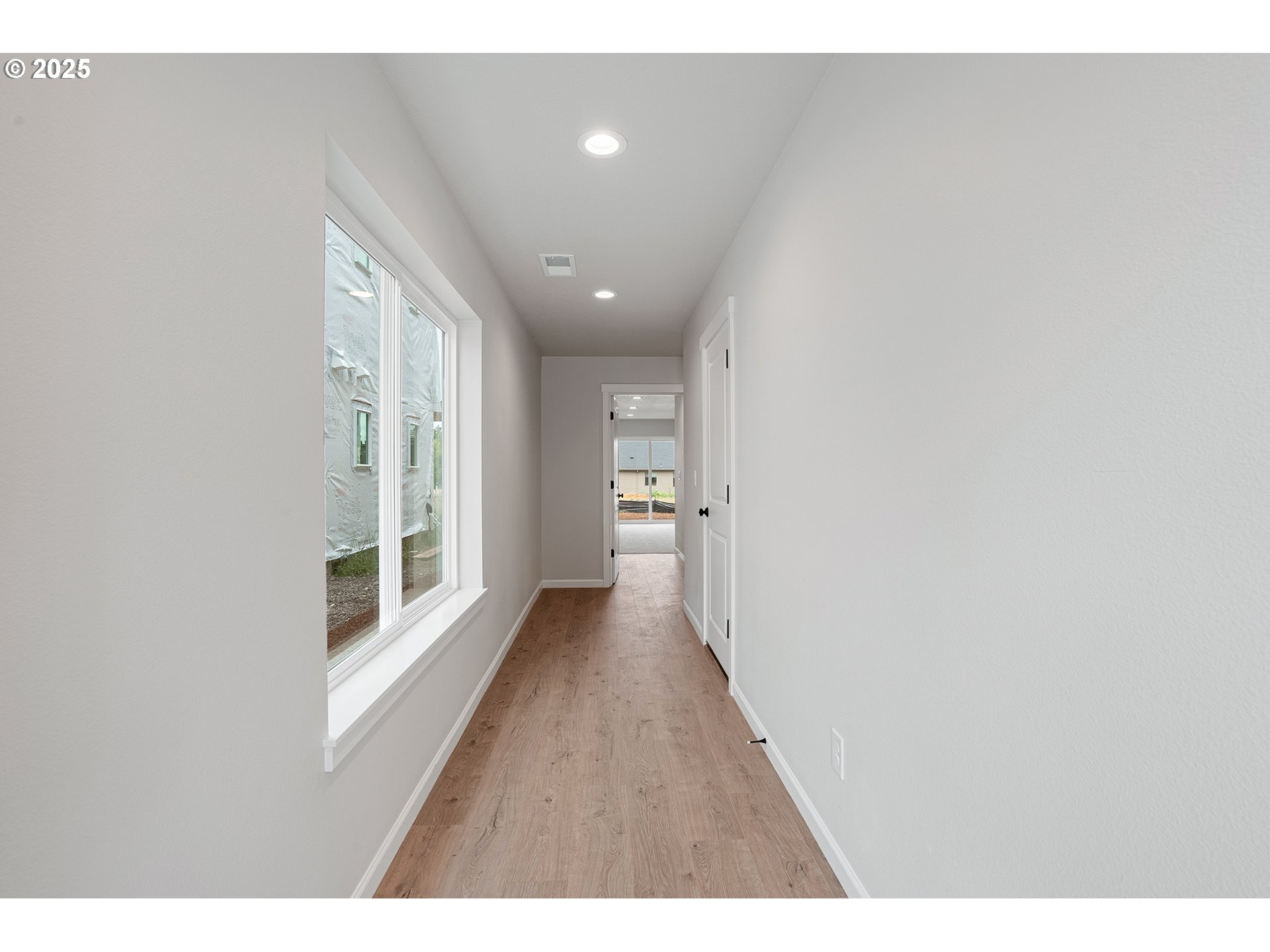 4652 Southeast 2nd Street Gresham, OR 97080 - Photo 3 of 30 a view of hallway with wooden floor