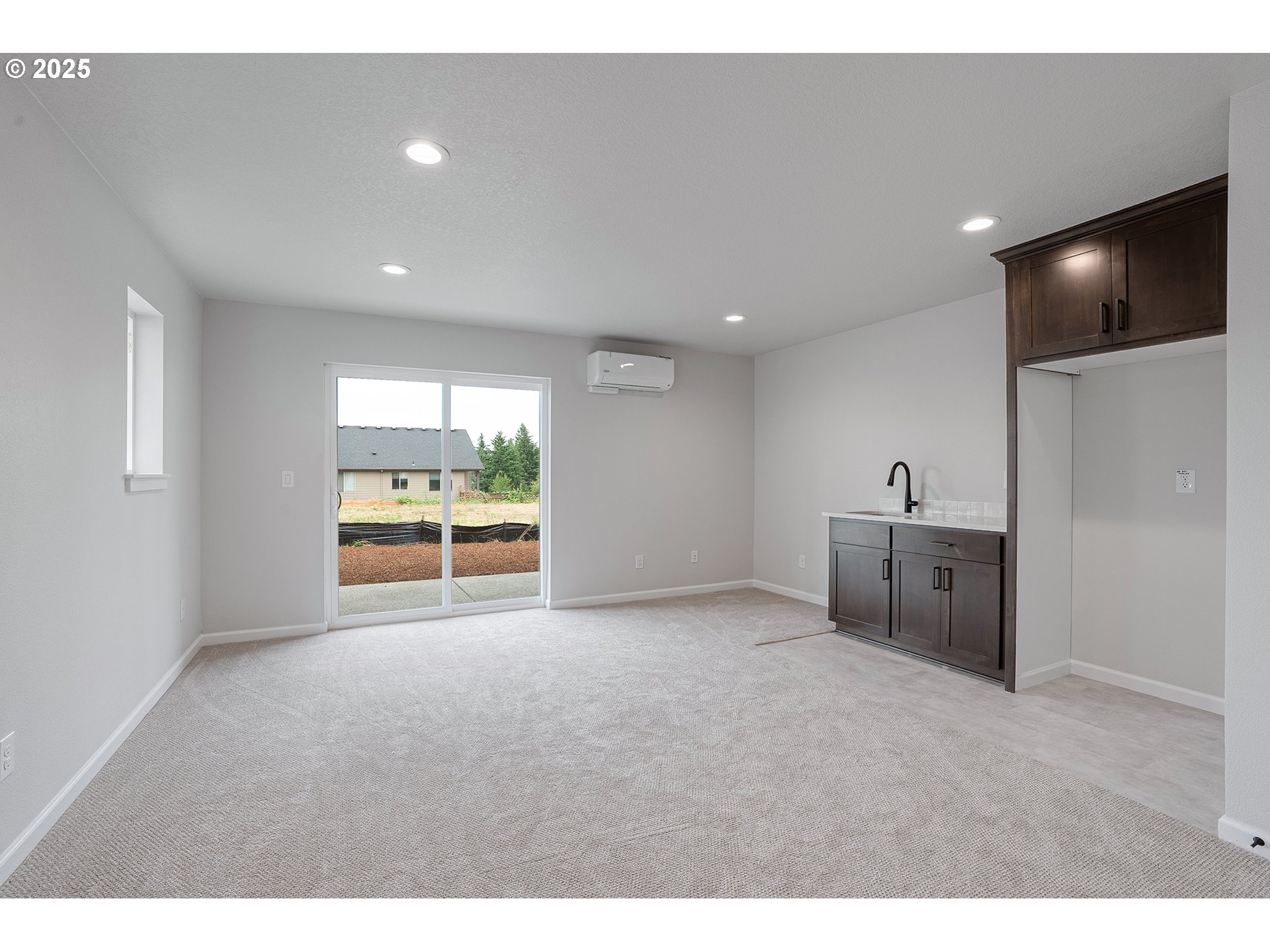 4652 Southeast 2nd Street Gresham, OR 97080 - Photo 4 of 30 a view of a livingroom with furniture kitchen and a window