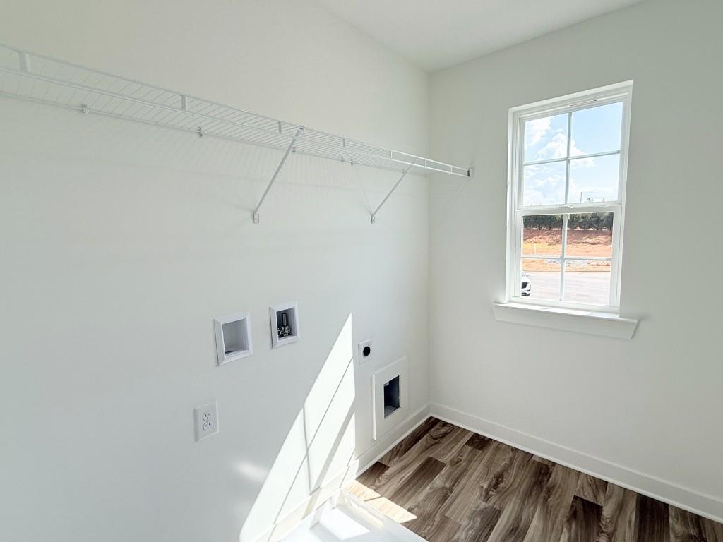 123 Purackal Lane Statham, GA 30666 - Photo 22 of 49 a view of a room with rack on the wall