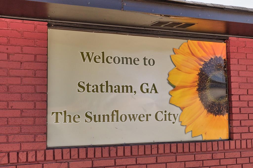 123 Purackal Lane Statham, GA 30666 - Photo 29 of 49 a building with a sign on it