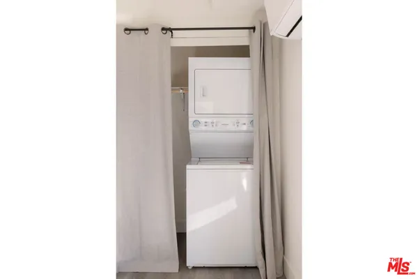 a bathroom with a toilet sink and shower