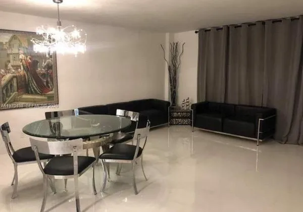 a table and chairs in a room