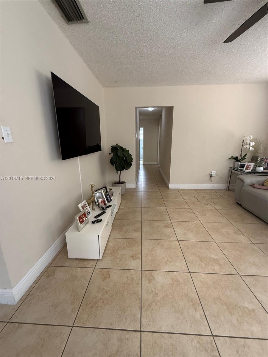 6720 Southwest 21st Street, Unit 1 Miami, FL 33155 - Photo 5 of 26 a view of a livingroom with furniture