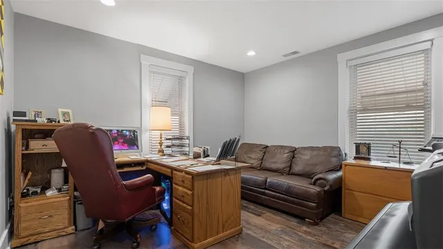 a living room with furniture and a window