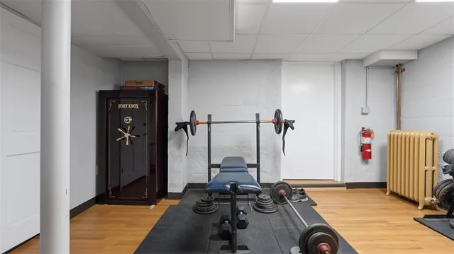 a room with furniture and gym equipment