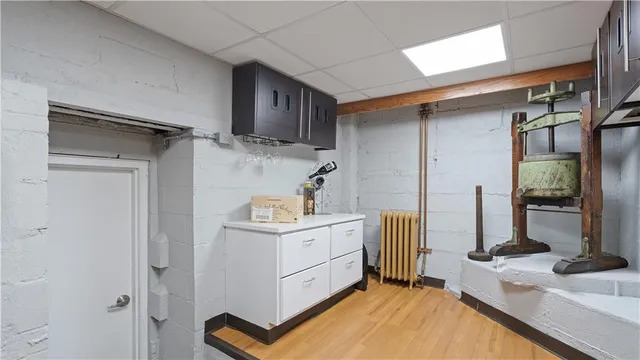 a kitchen with a sink appliances and cabinets