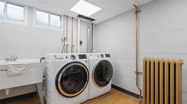 a utility room with dryer and washer