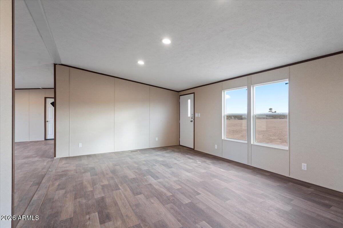 53512 West Organ Pipe Road Maricopa, AZ 85139 - Photo 12 of 44 a view of an empty room with a window