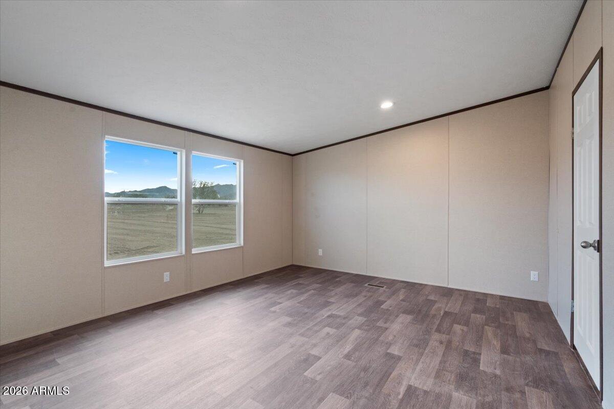 53512 West Organ Pipe Road Maricopa, AZ 85139 - Photo 21 of 44 a view of an empty room with a window